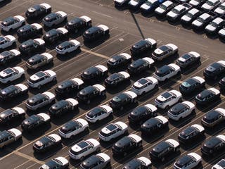 Cars, including Land Rovers, a British brand manufactured by Jaguar Land Rover (JLR), a subsidiary of Tata Motors at Port of Southampton on April 03, 2025 in Southampton, England
